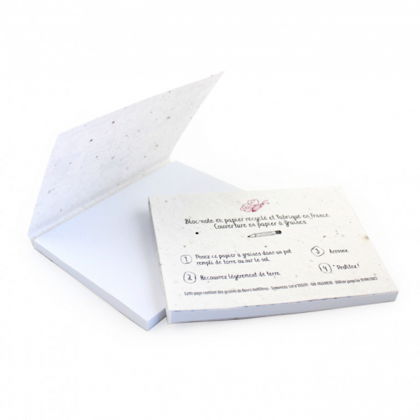 Bloc-note papier graines personnalisable, goodie made in France avec couverture de fleurs ensemencée, format compact pour communication écologique.