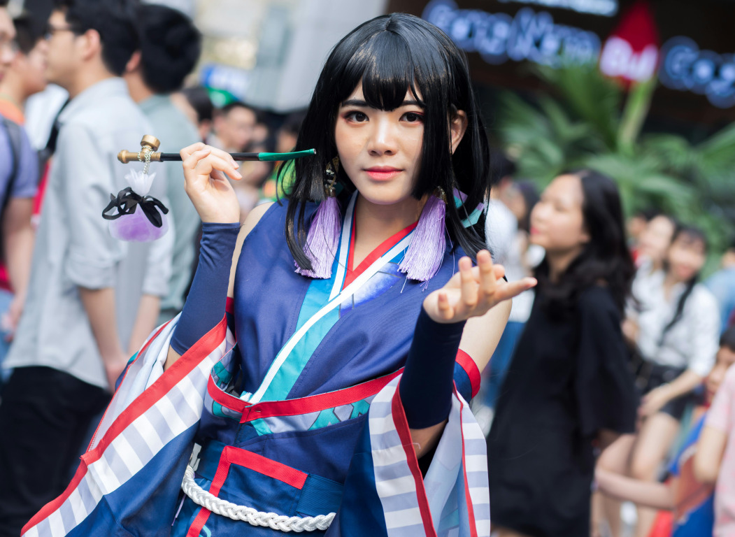 Visiteur déguisé en cosplay, personnage de fiction lors d'un rassemblement sur la culture japonaise
